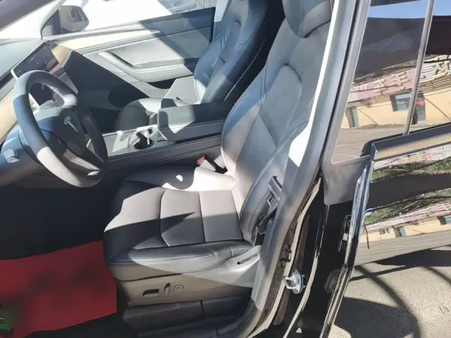 Tesla Model Y — Фото автомобиля 14