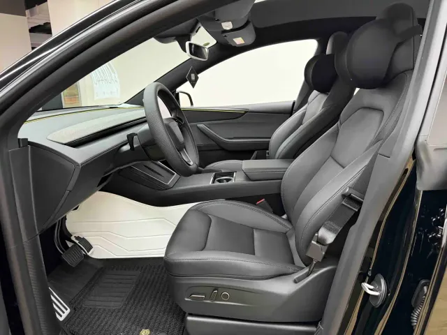 Tesla Model Y — Фото автомобиля 8