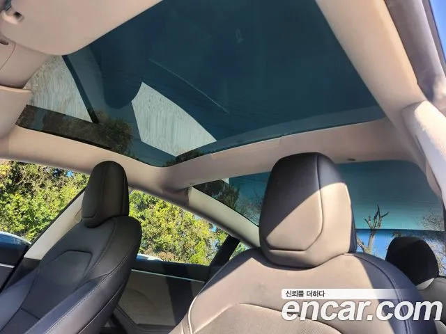 Tesla Model 3 — Фото автомобиля 11
