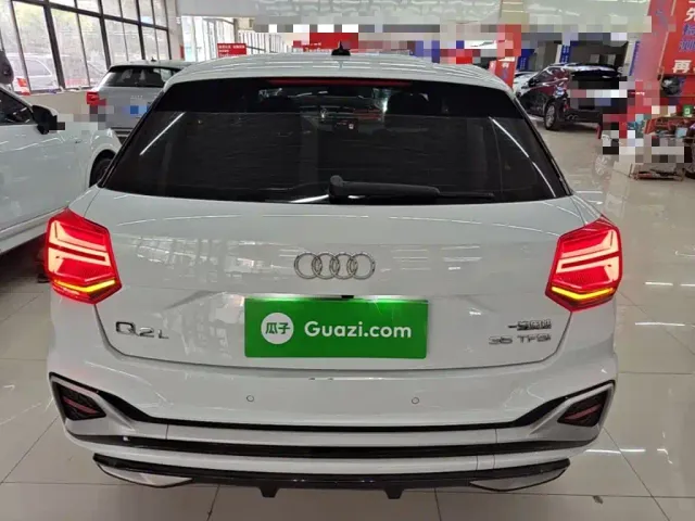 Audi Q2L — Фото автомобиля 5