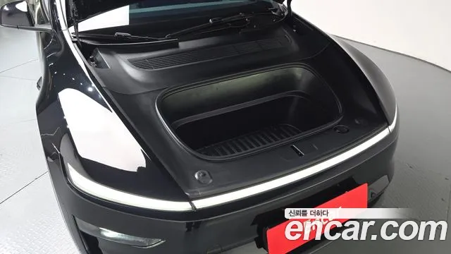 Tesla Model Y — Фото автомобиля 5
