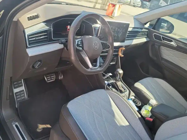 Volkswagen Tiguan L — Фото автомобиля 12