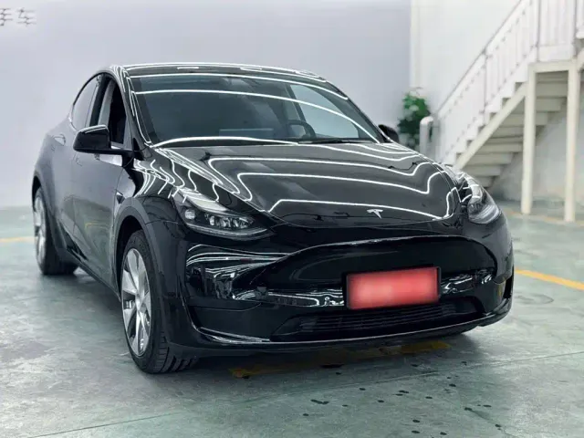 Tesla Model Y — Фото автомобиля 24