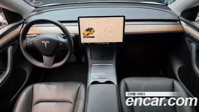 Tesla Model Y — Фото автомобиля 7