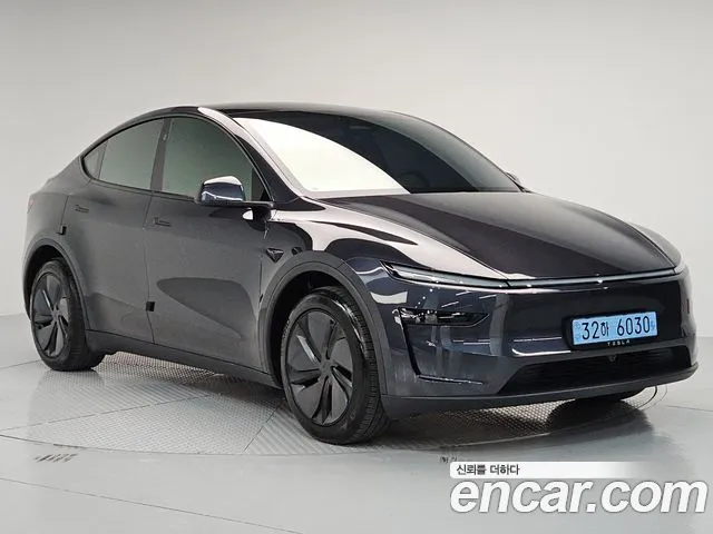 Tesla Model Y — Фото автомобиля 2