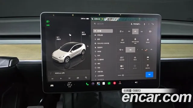 Tesla Model Y — Фото автомобиля 14