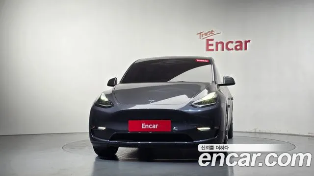 Tesla Model Y — Фото автомобиля 3