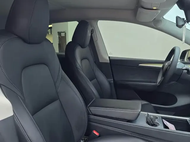 Tesla Model Y — Фото автомобиля 8