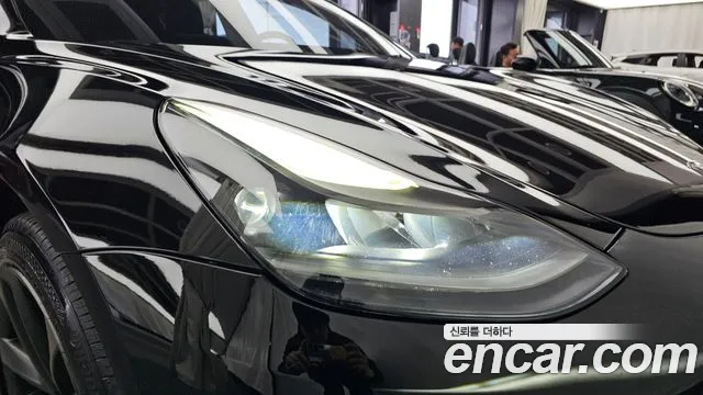 Tesla Model 3 — Фото автомобиля 7