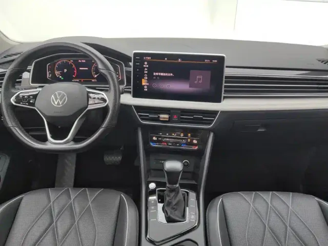 Volkswagen Tiguan L — Фото автомобиля 12