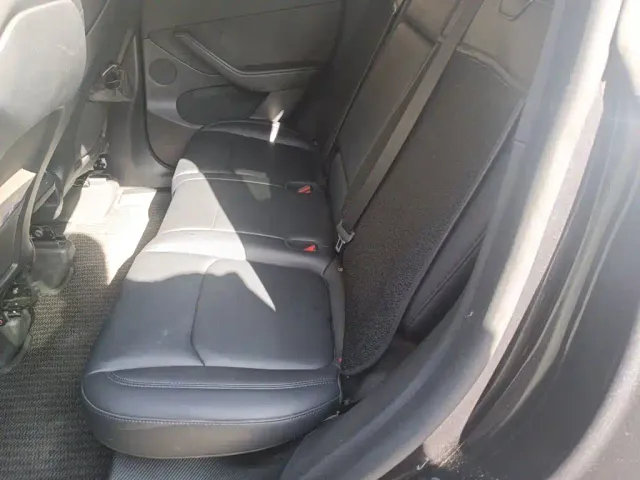 Tesla Model Y — Фото автомобиля 13