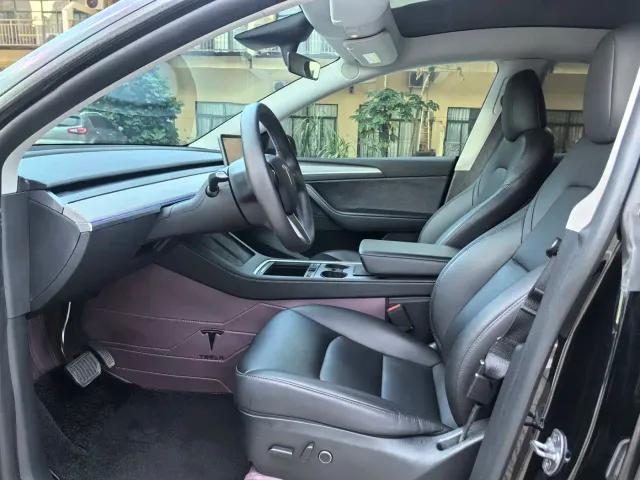 Tesla Model Y — Фото автомобиля 8