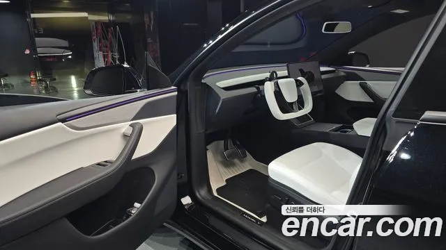 Tesla Model Y — Фото автомобиля 10