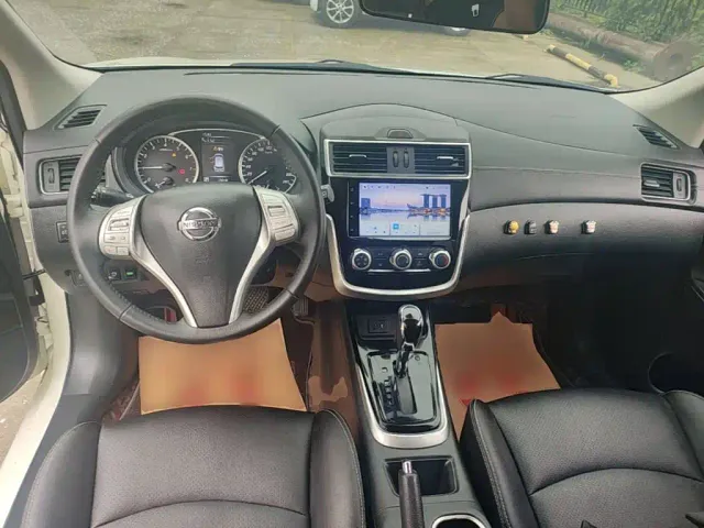 Nissan Tiida — Фото автомобиля 9