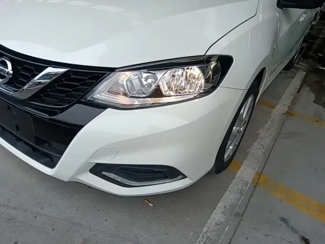 Nissan Tiida — Фото автомобиля 23