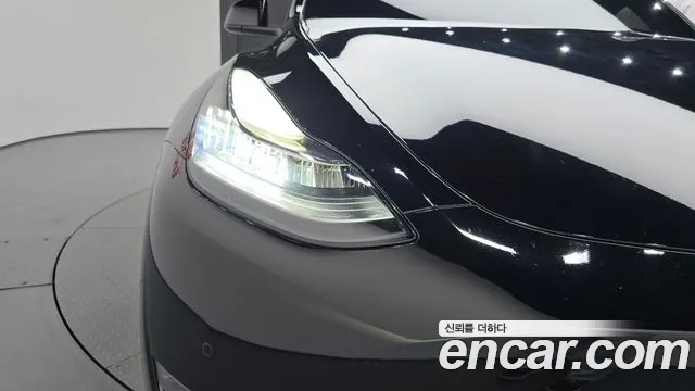 Tesla Model Y — Фото автомобиля 22