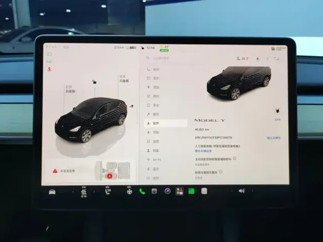 Tesla Model Y — Фото автомобиля 14