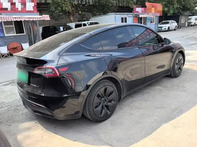 Tesla Model Y — Фото автомобиля 6