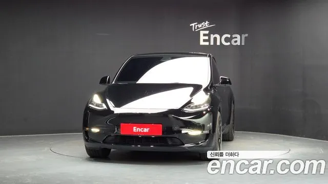 Tesla Model Y — Фото автомобиля 3