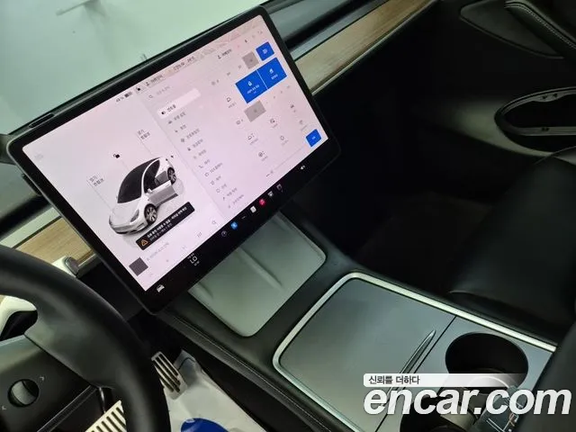 Tesla Model Y — Фото автомобиля 10