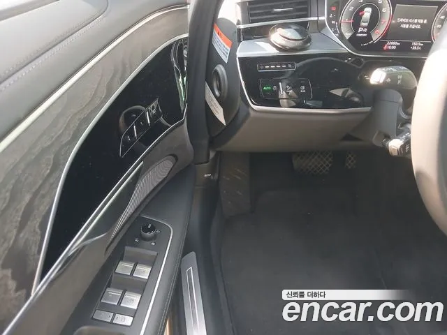 Audi A8 55 TFSI quattro Premium LWB — Фото автомобиля 6