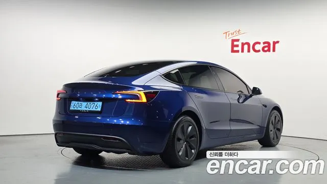 Tesla Model 3 — Фото автомобиля 2