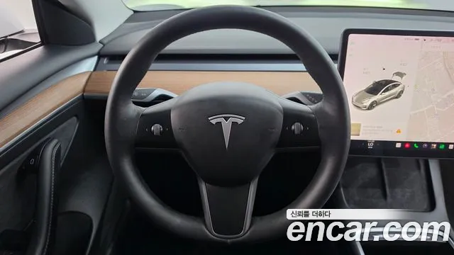 Tesla Model 3 — Фото автомобиля 6