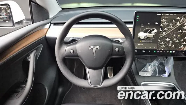 Tesla Model Y — Фото автомобиля 19