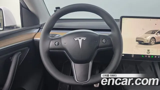 Tesla Model Y — Фото автомобиля 21