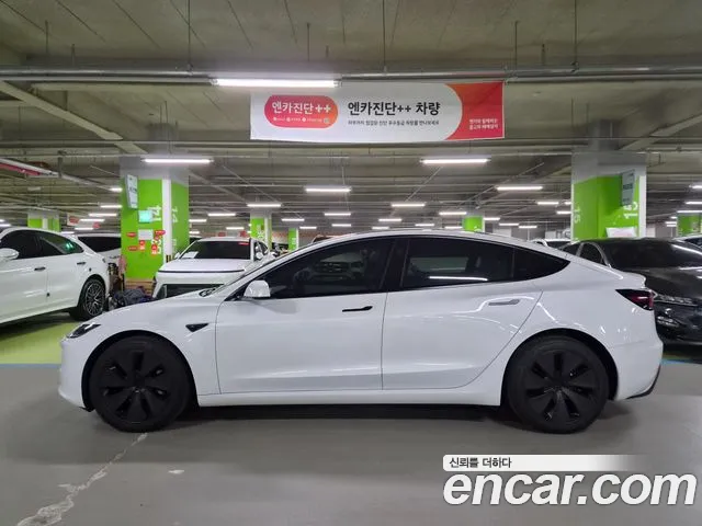 Tesla Model 3 — Фото автомобиля 5