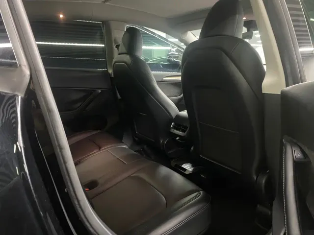 Tesla Model Y — Фото автомобиля 7