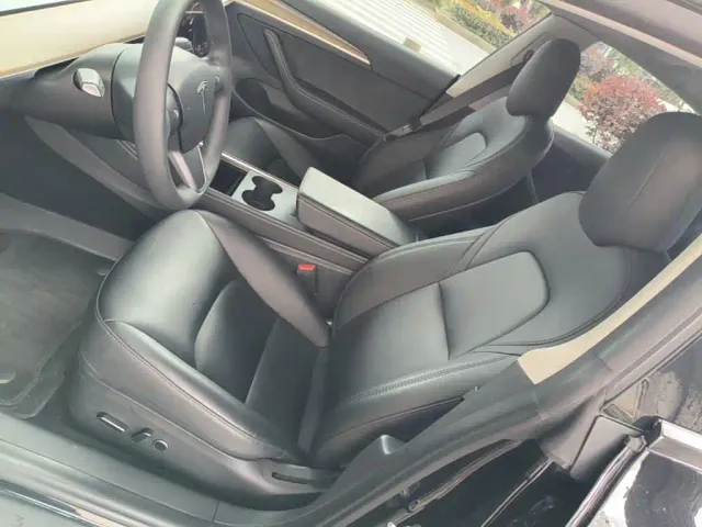 Tesla Model 3 — Фото автомобиля 14