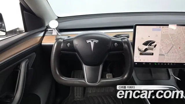 Tesla Model Y — Фото автомобиля 19
