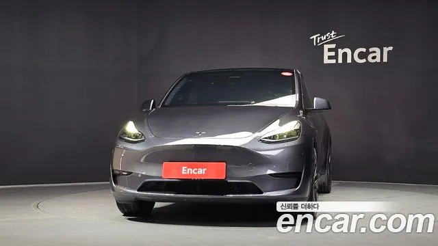 Tesla Model Y — Фото автомобиля 3
