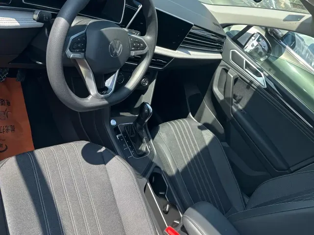 Volkswagen Tiguan L — Фото автомобиля 4