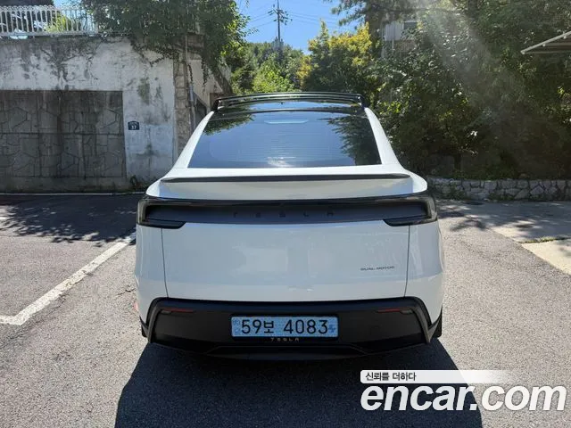 Tesla Model Y — Фото автомобиля 4
