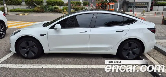 Tesla Model 3 — Фото автомобиля 4