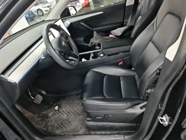 Tesla Model Y 2024 Rear-Wheel Drive Version — Фото автомобиля 14