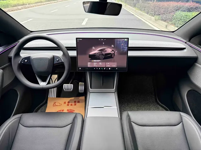 Tesla Model Y — Фото автомобиля 12