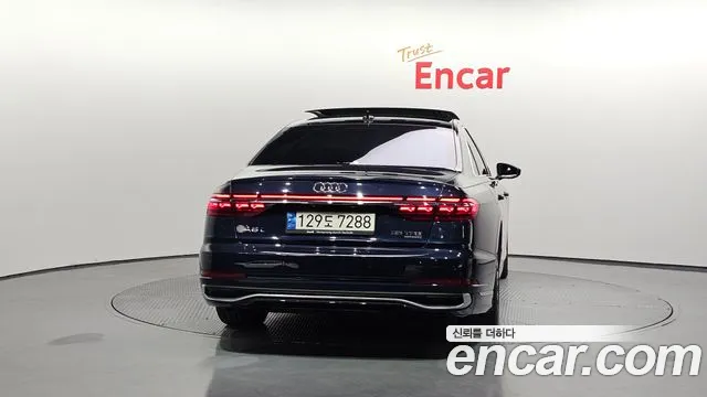 Audi A8 55 TFSI quattro Premium LWB — Фото автомобиля 4