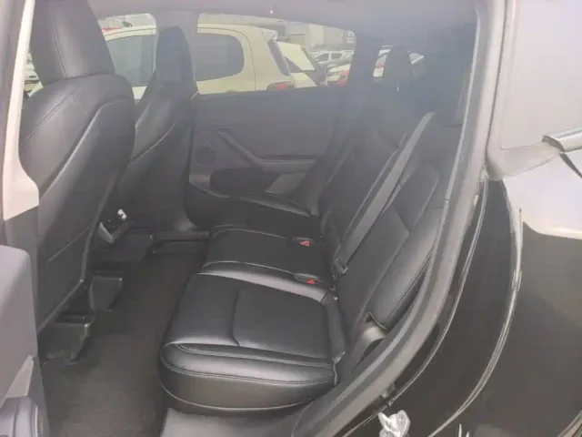 Tesla Model Y — Фото автомобиля 16