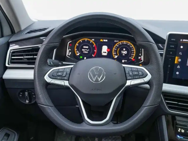 Volkswagen Tiguan L — Фото автомобиля 11