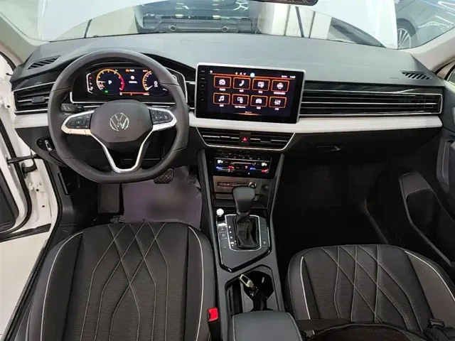 Volkswagen Tiguan L — Фото автомобиля 9