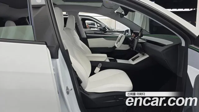 Tesla Model Y — Фото автомобиля 26