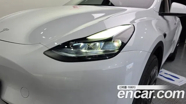 Tesla Model Y — Фото автомобиля 7