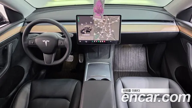 Tesla Model Y — Фото автомобиля 10