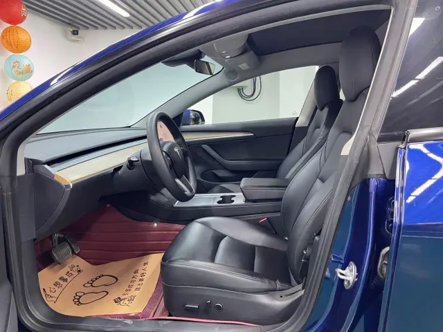 Tesla Model 3 — Фото автомобиля 8