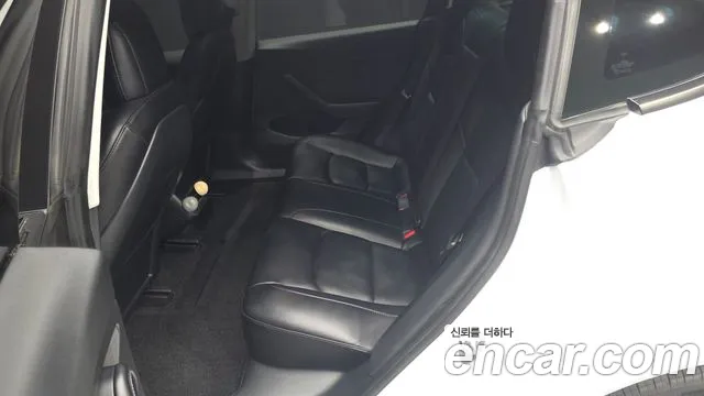 Tesla Model 3 — Фото автомобиля 18