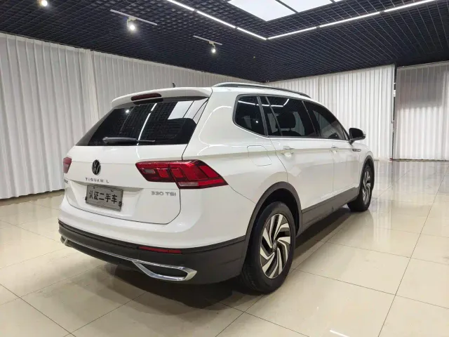 Volkswagen Tiguan L — Фото автомобиля 5