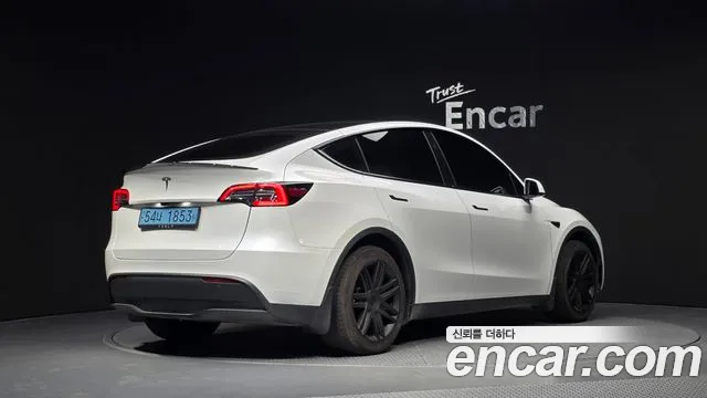 Tesla Model Y — Фото автомобиля 2